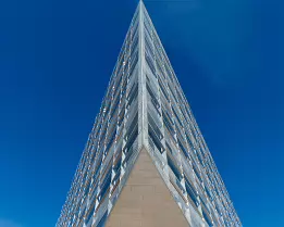 Sharp Geometry Sharp glass wedge of Krystallen office building pointing skyward in Copenhagen.