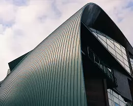 Art Architecture Curved glass and metal façade of Kiasma Museum of Contemporary Art near Helsinki Central Station.
